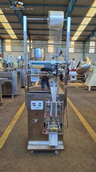 Dosing and packaging machine for granular and powdered products